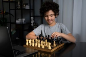 Children playing chess as part of educational games for kids in Africa